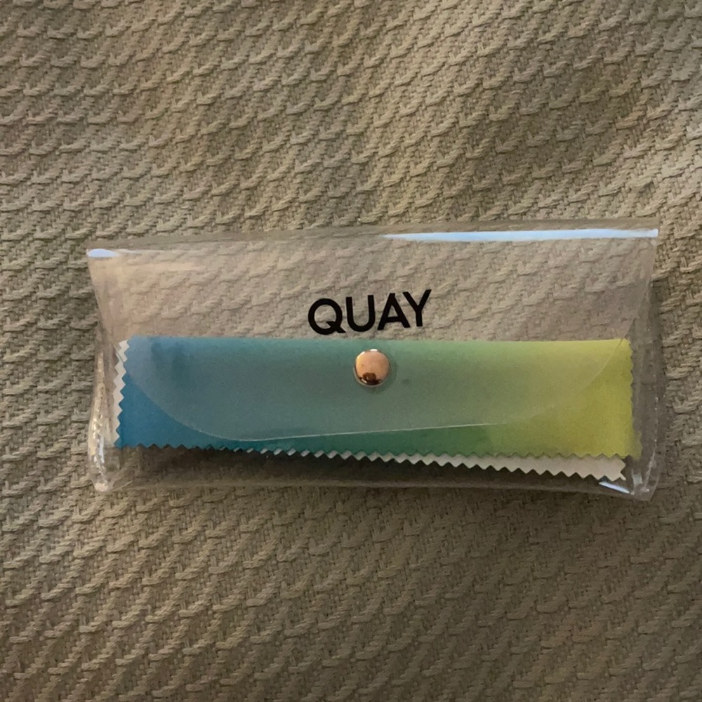 Quay clear sunglasses case with cleaner